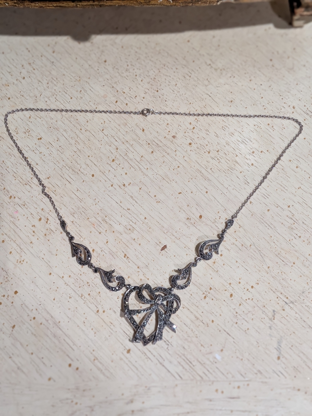 Silver-Tone Bow Pendant Necklace - Elegant Women’s Jewelry Marcasite